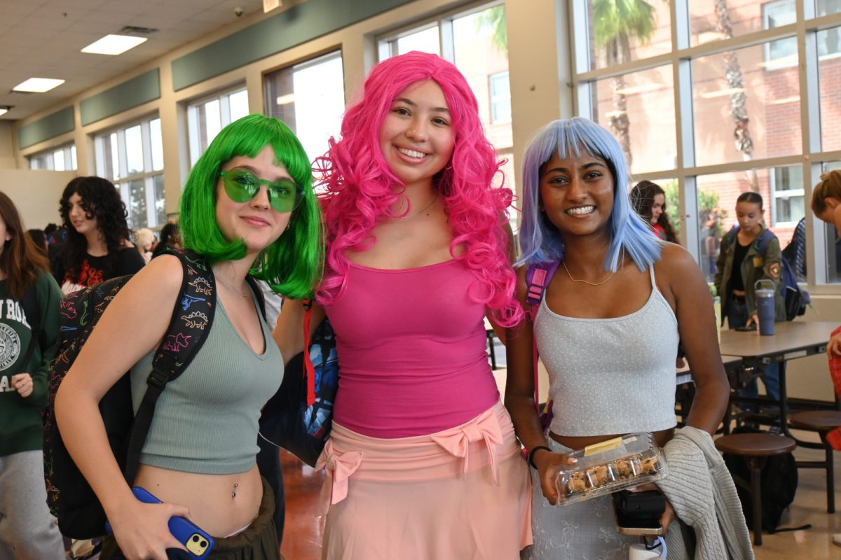 Seniors Claudia Hernandez-Cruz (Left), Sophia Gallego, and Ankitha Vustepalli showing superheros vs. superstars spirit.